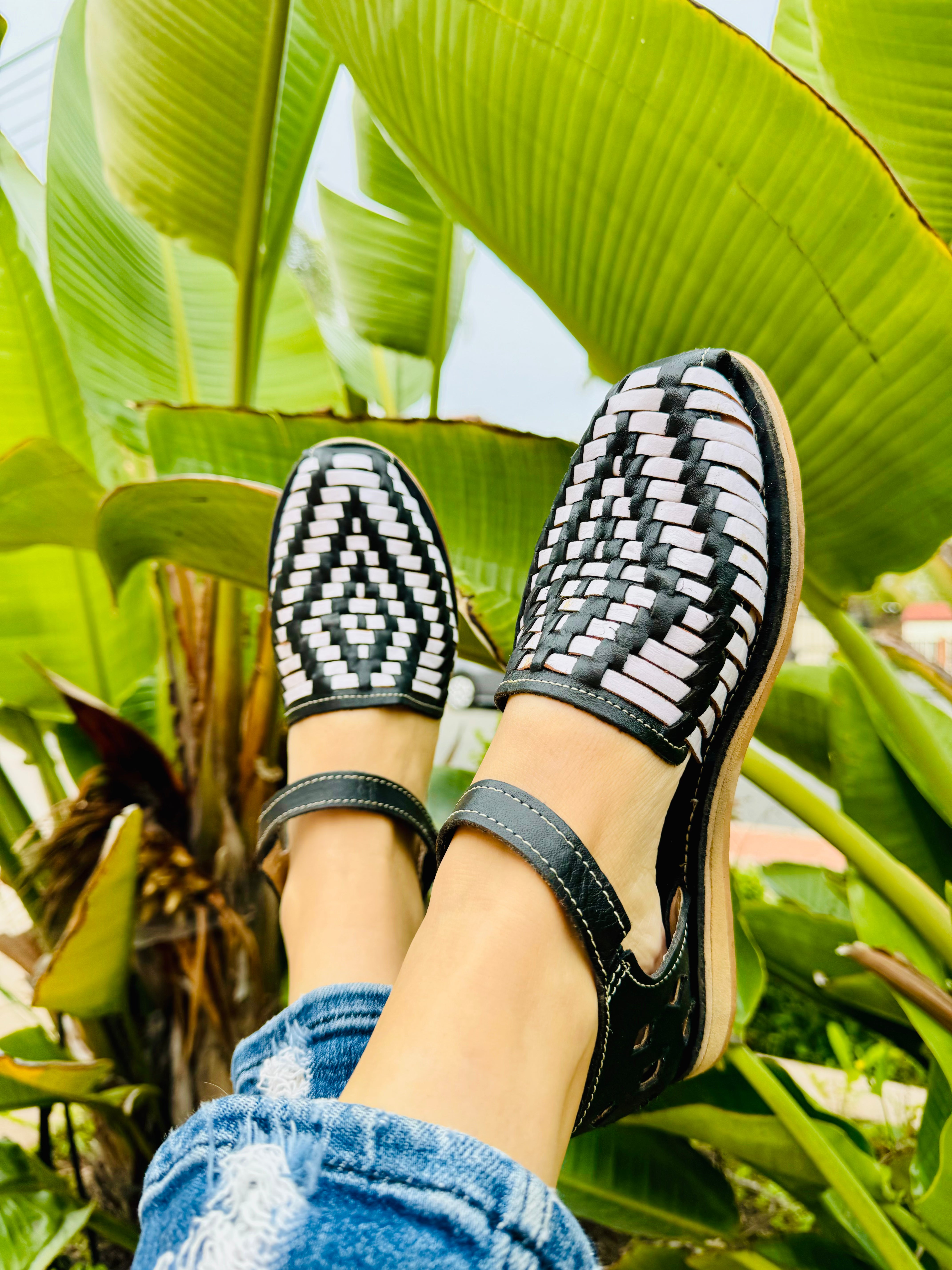 black and white woman's sandal